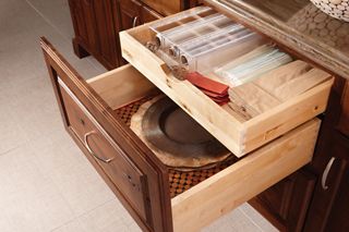 Drawer base with tiered storage and acrylic wrap dispenser.jpg